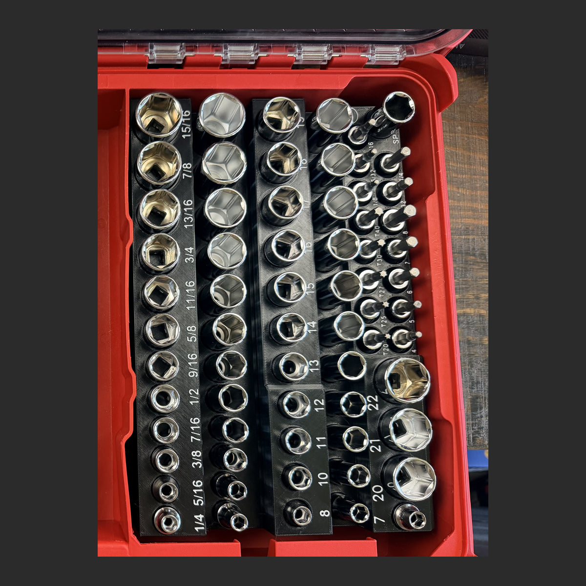Husky H70MTS3D 3/8" socket organizer insert in black with white labels, all 66 sockets standing upright in a Milwaukee Packout
