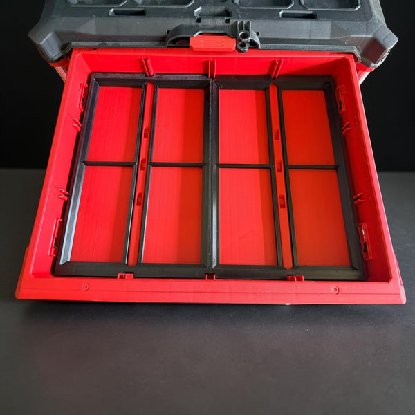 Shallow-drawer adapter seated in a Milwaukee Packout drawer with the tool box lid open above it