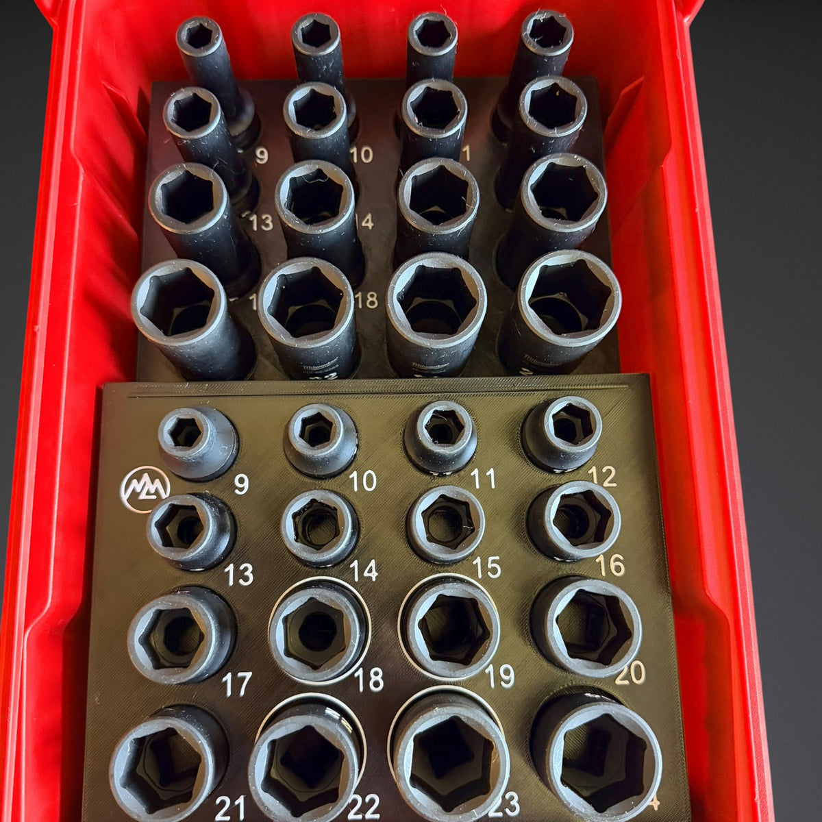 Milwaukee Shockwave 1/2" metric 9-24mm deep and shallow sockets loaded in the organizer insert inside a Packout deep organizer