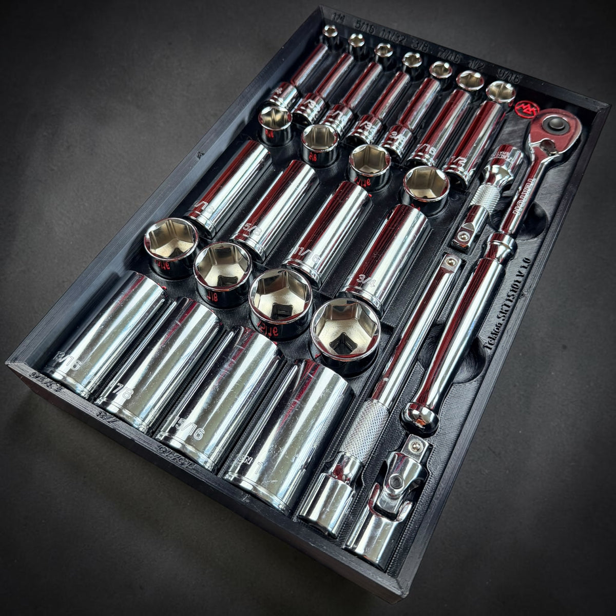 Black 3D-printed socket organizer for the Tekton SKT15101 3/8" drive SAE set, loaded with chrome sockets, ratchet and extensions